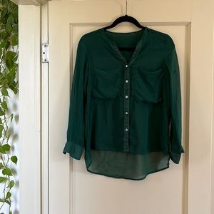 Green blouse with opal buttons